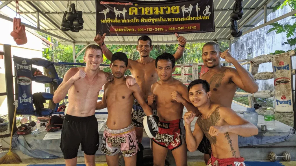 A group of Muay Thai fighters pose for a picture