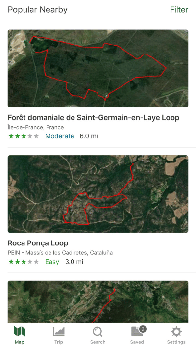 Search results on Gaia GPS app showcasing popular nearby trails, including the Forêt domaniale de Saint-Germain-en-Laye Loop and Roca Ponça Loop with satellite imagery and trail outlines.