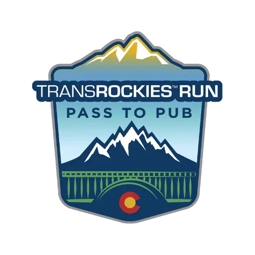 TransRockies Run Pass to Pub logo featuring layered blue mountains above a bridge with a Colorado flag symbol centered below. The badge style logo uses shades of blue and green with the event name displayed prominently across the middle.